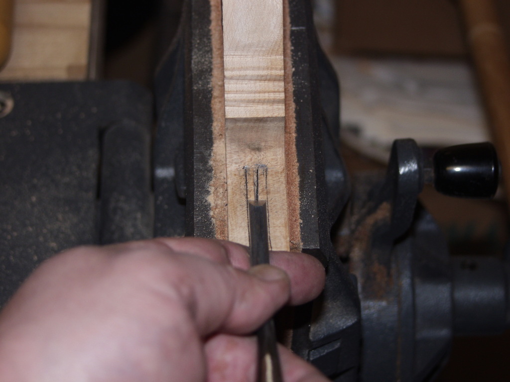Then I use a chisel close to the width to start it, and continue using it and a smaller one. Once you get the mortise started it will be hard to continue using the same chisel, so switching to a slightly narrower one is reccommended.